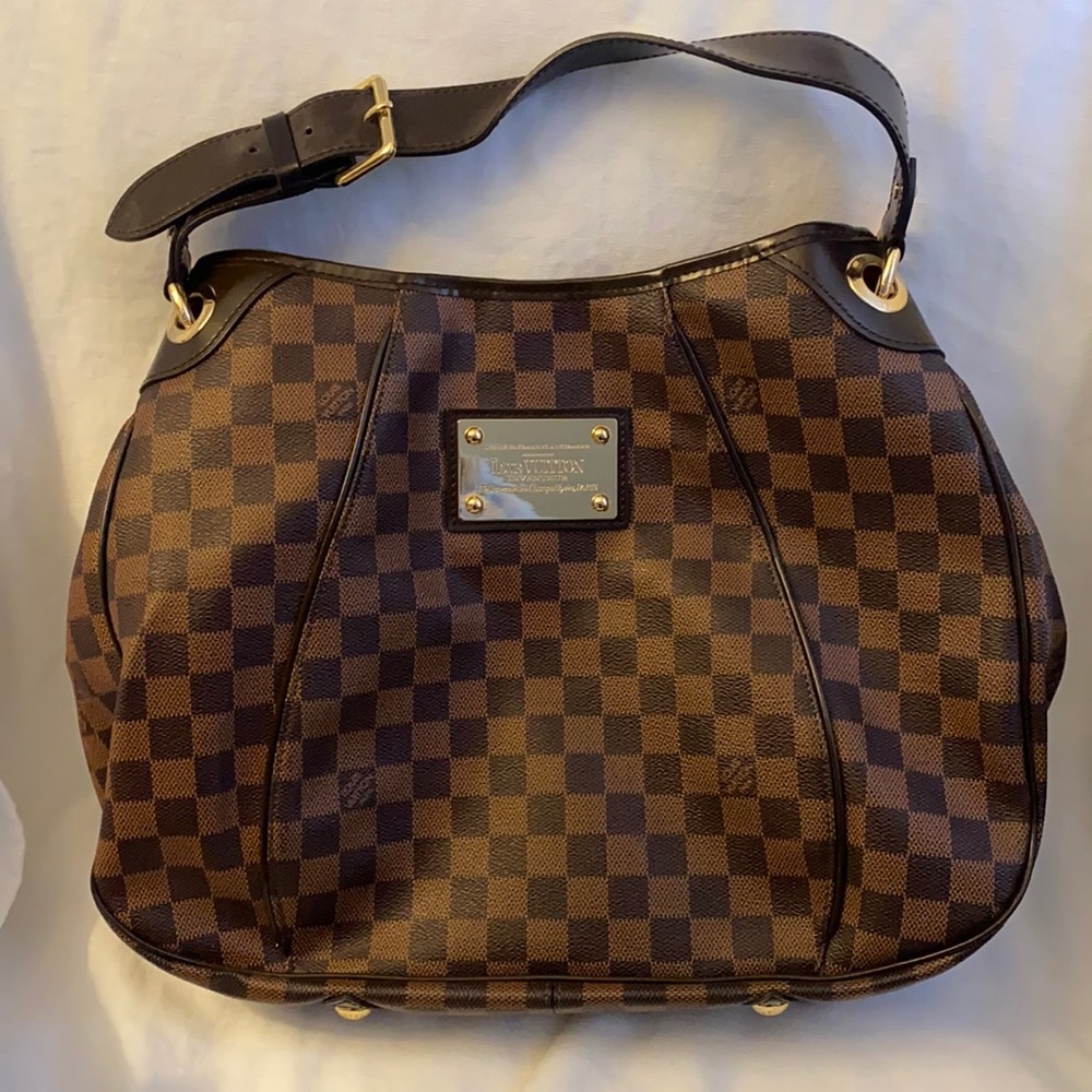 Large bag excellent condition brown with red interior and gold accents